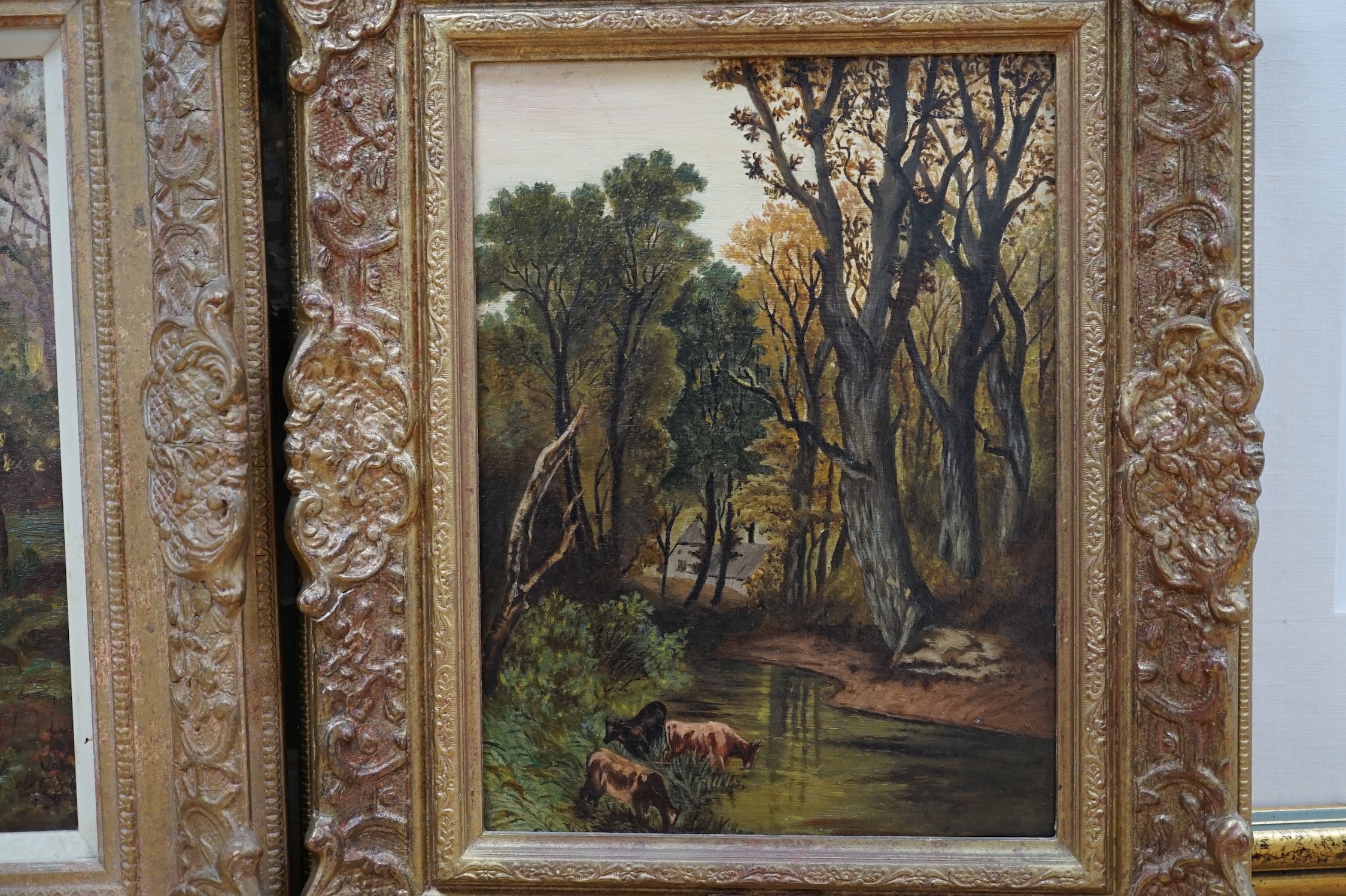 20th century English School, near pair of oils on canvas, Wooded landscapes with streams, 29 x 22cm. Condition - fair to good